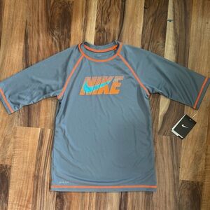 Nike Grey Athletic Top with Orange Trim and Teal Swoosh
